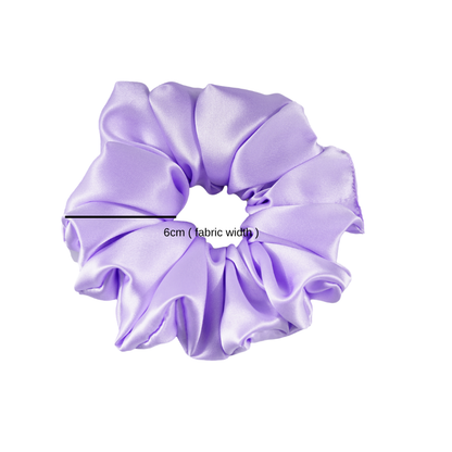 Oversized silk scrunchie statement style
